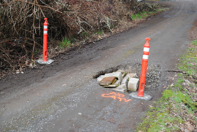 Culvert sinkhole. NO CATV (no cable tv, probably anywhere, because it is a wire in air).