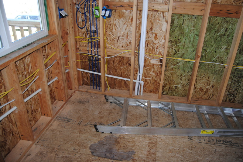 HVAC lines in Lois's loft.