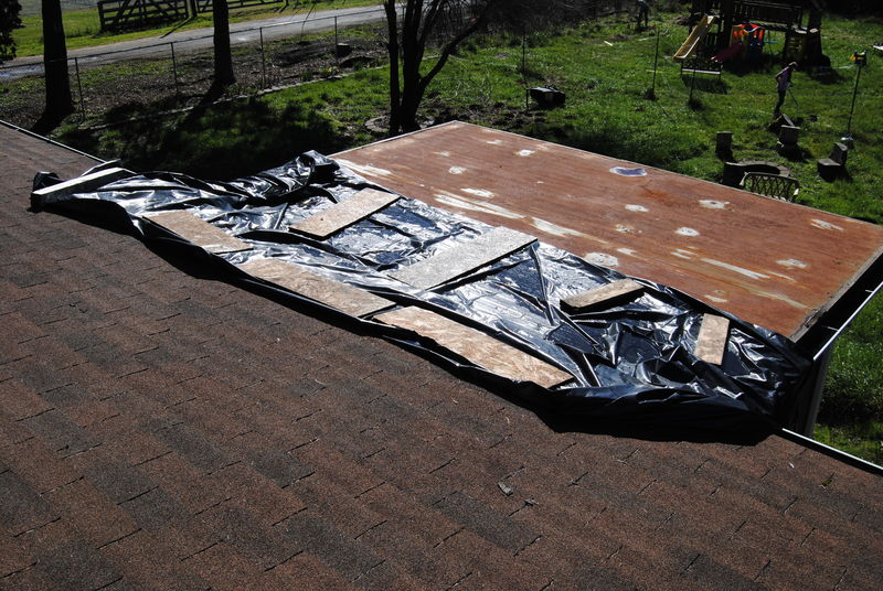 Plastic covering the end of the roof.