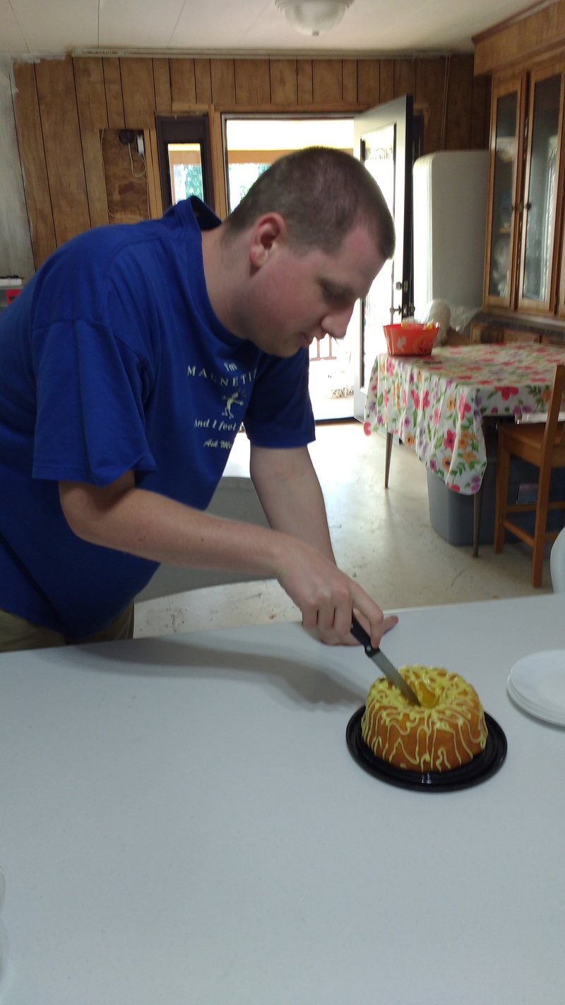 Isaac cutting his birthday cake. Happy Birthday Isaac.