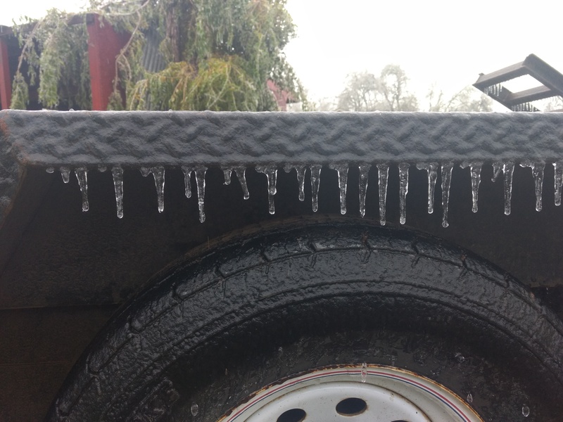 Small icicles hanging on a trailer.