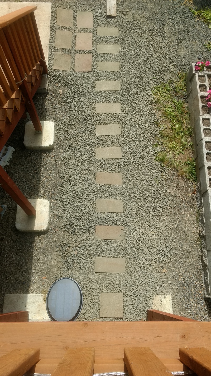 Lois made the walkway with pavers left over from Stacia's.