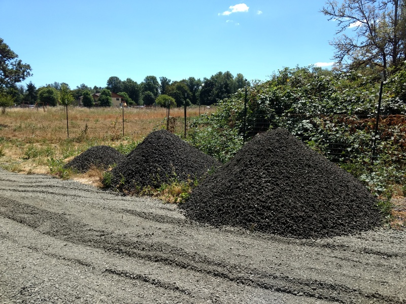 Piles of Gravel waiting to be moved by Mikey onto Ash Lane.