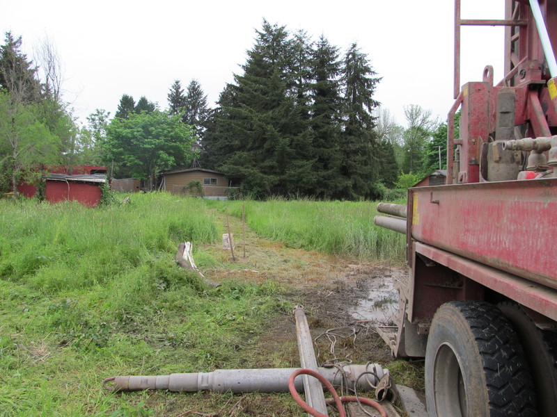 View of the cottage from the well-drilling equipment