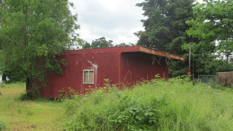 SW side of red shed.