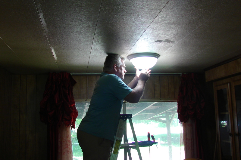Installing a ceiling light in the China room