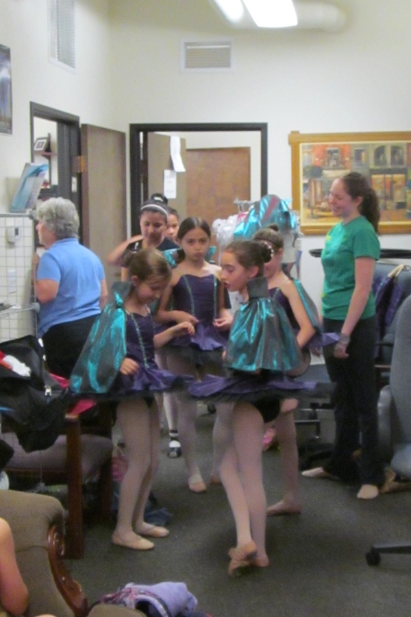 Latia had to go to ballet practice. Here they are in their costumes for their next performance.