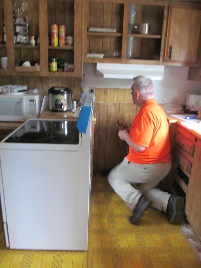 Don is working on the site prep. It only took about 12 hours of shopping to get to bring the stove home.