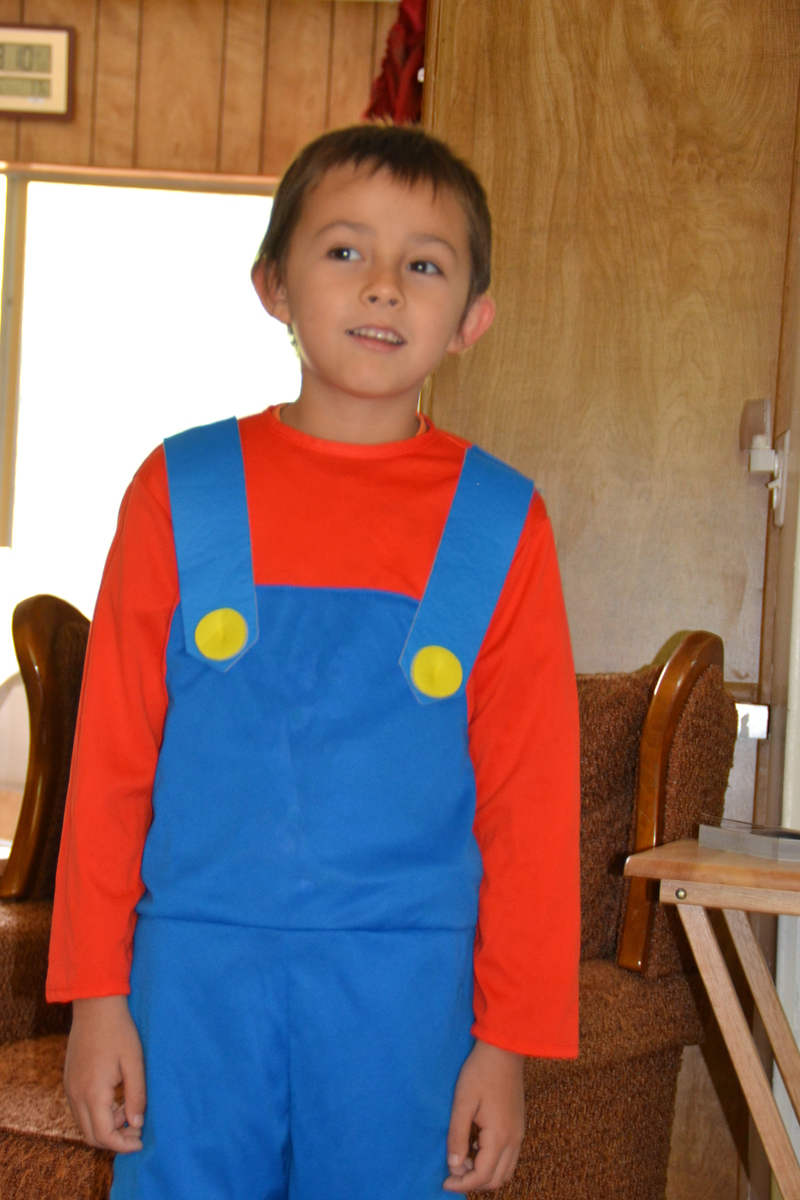 I bought some dress up clothes. Alex being Mario.