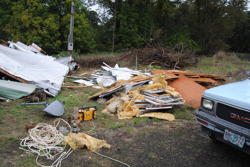 Piles of debris from the white trailer.