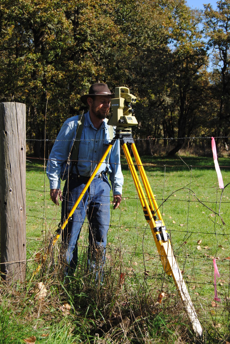 Don Rowe working on the northeast survey marker.