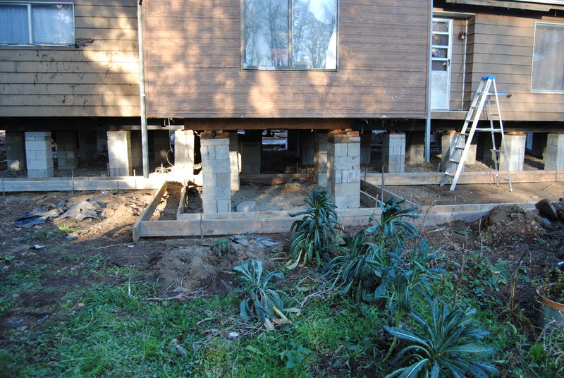 Wood frames on the south side of the house later in the day.