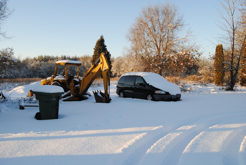 Goliath the Backhoe and van in snow.