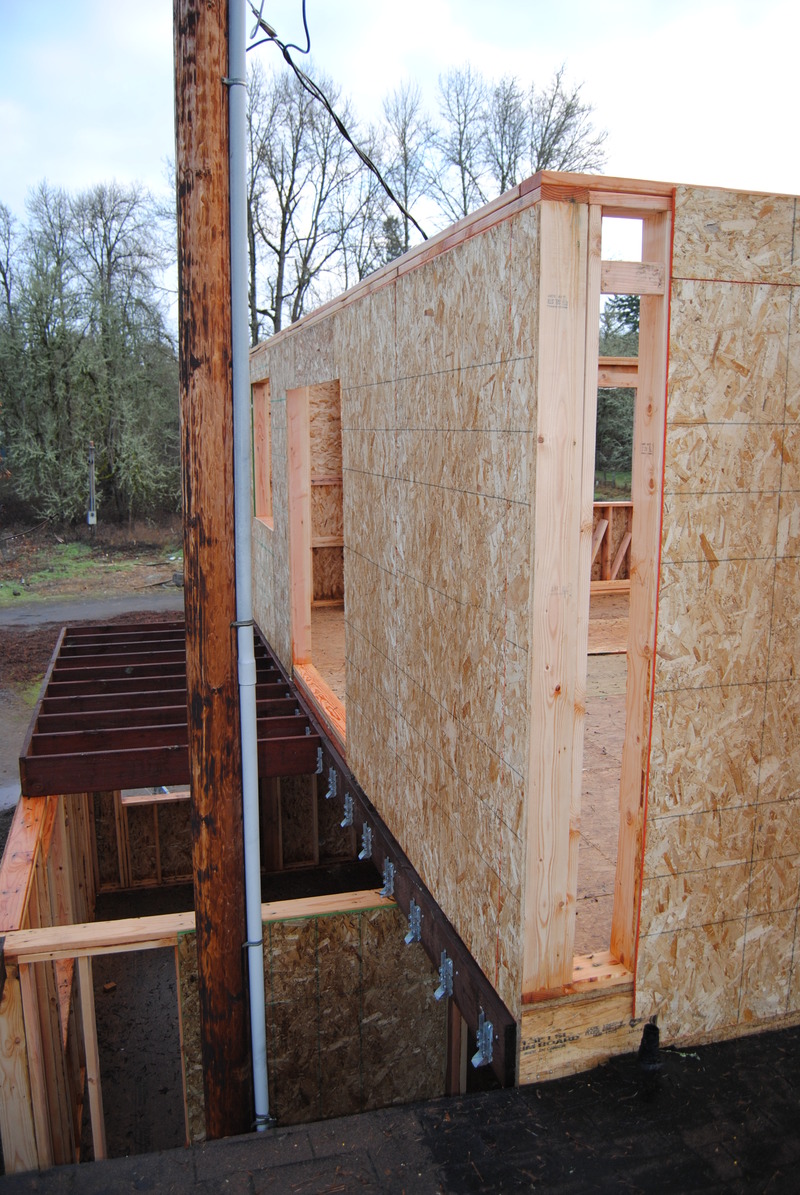 Lois's Loft balcony, seen from above the master bathroom. Power pole is still in place. Some support beams are in place.