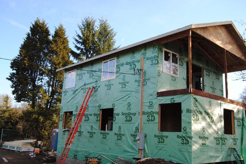 View of the northwest corner of the addition. Windows are installed on Lois's north wall and west wall.