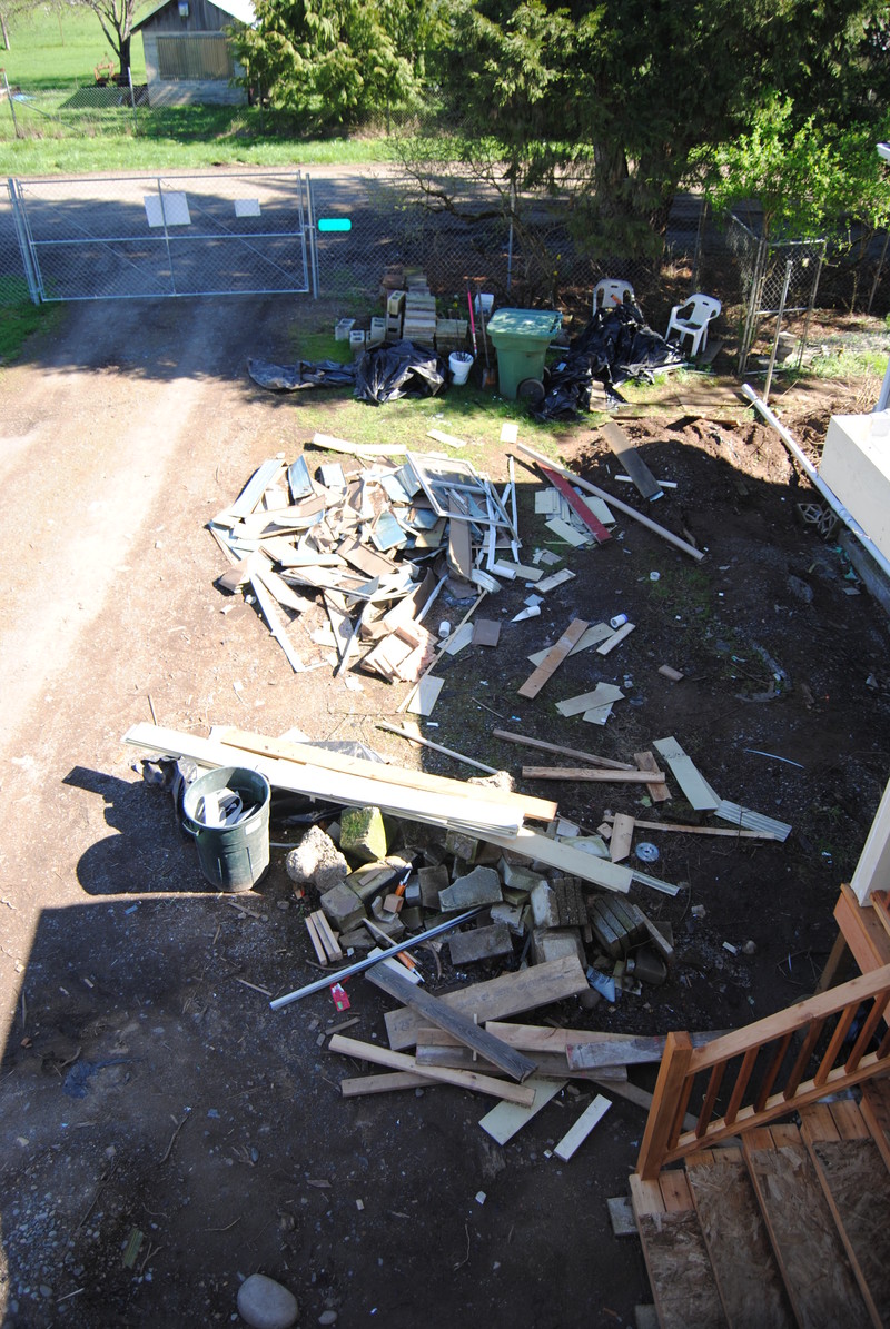 View of construction debris northeast of the front deck.