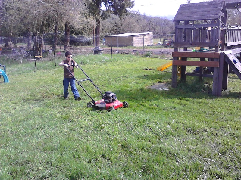 Mikey mowing the picnic area.