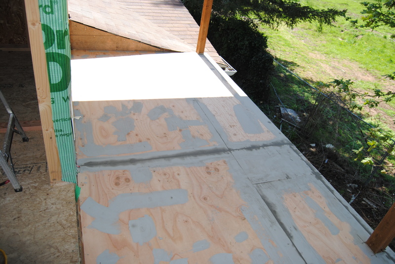 Progress sealing Lois's deck in preparation for the floor.