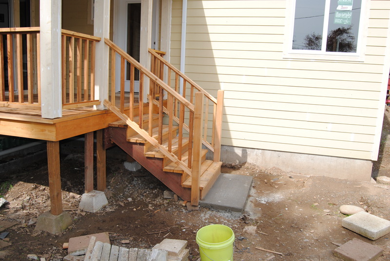 Front steps with cement landing.