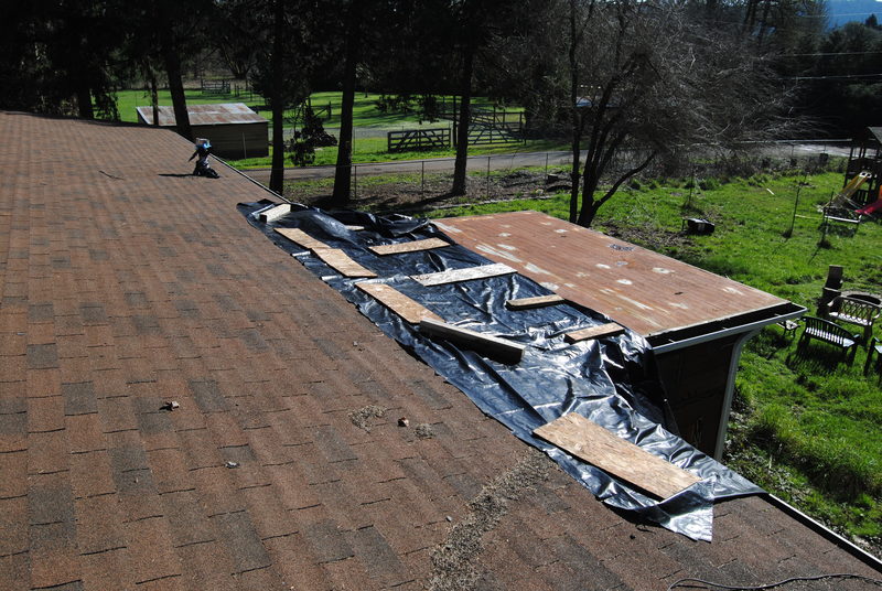 Tarp on the roof to see if this prevents leaking.