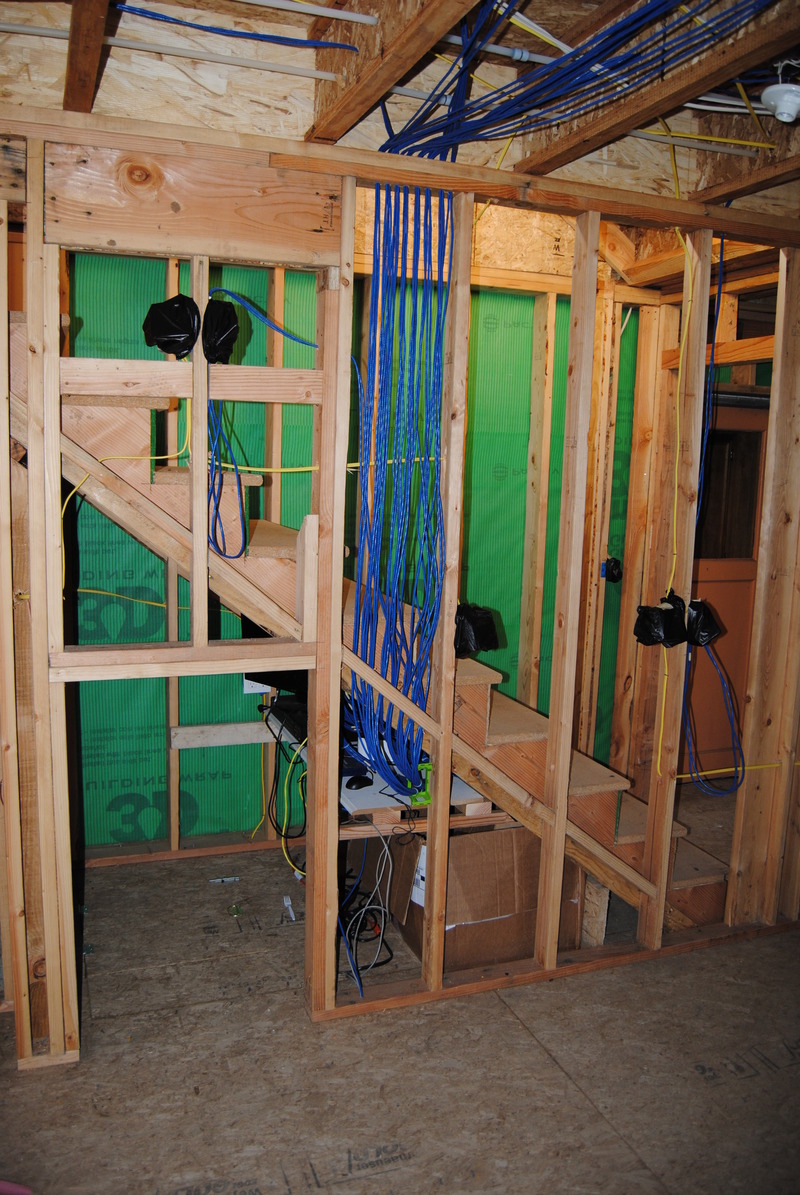 Network closet, ready for insulation and drywall on the larger side of the space.