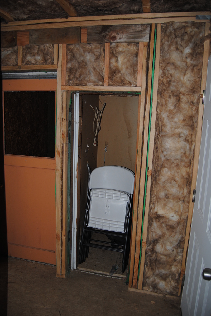 Old water heater closet. Insulation.