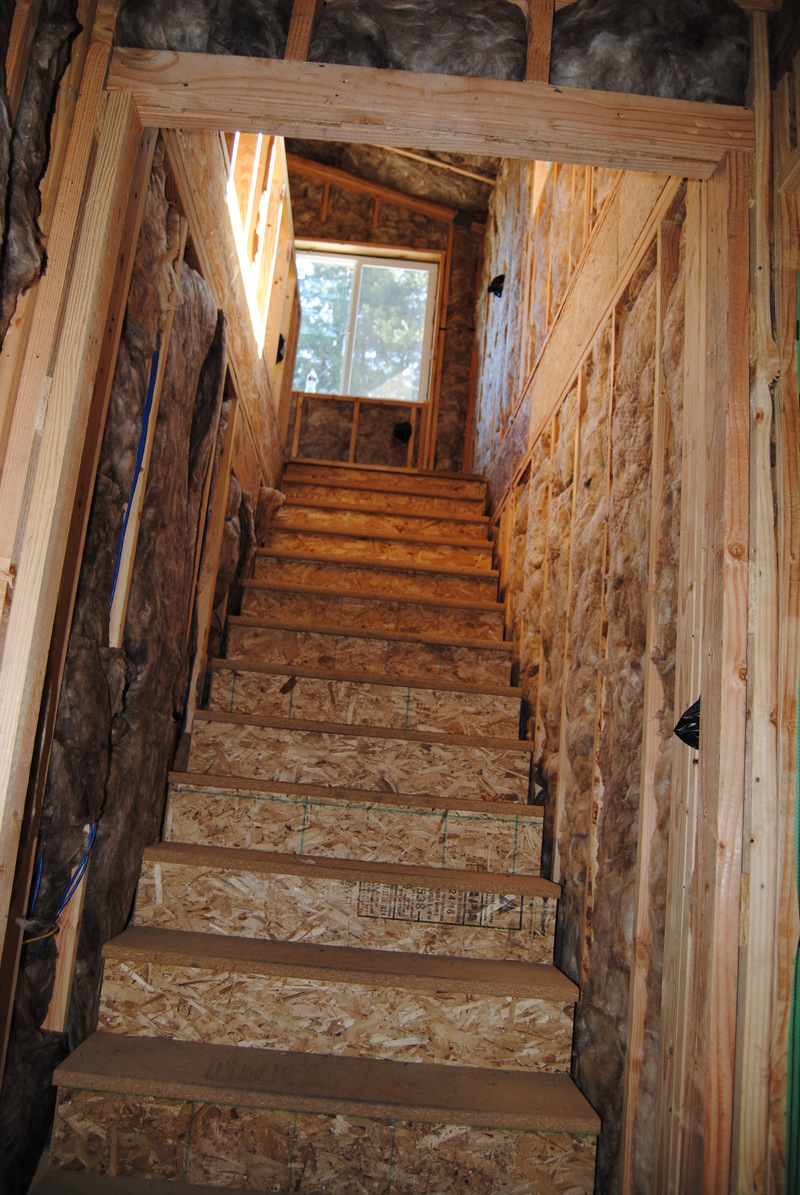 Stairway up to Lois's loft. Insulation.