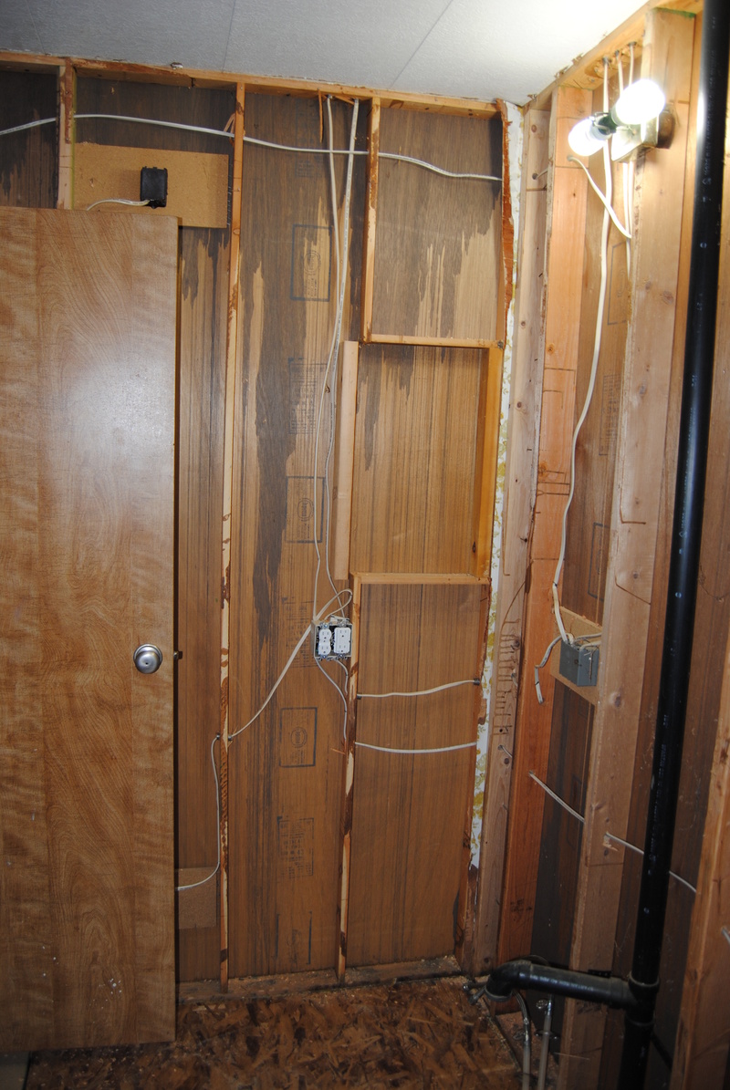 South side of the main bathroom with two outlets instead of an outlet and light switch.