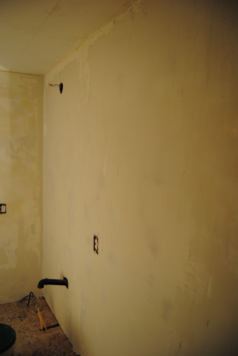West wall of main bathroom after second wall of mud.