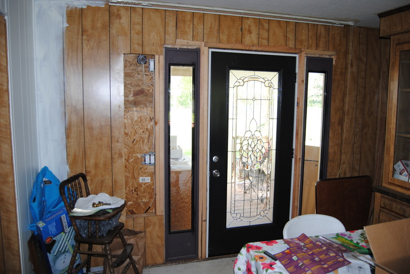 Inside the front door area.  Should we replace the panel with sheet rock?