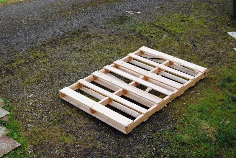 Here is the empty pallet after Joseph carried all the tables into Don's study.