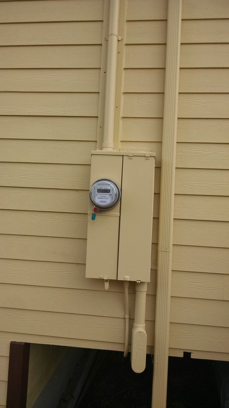 north side of the house, electric meter.