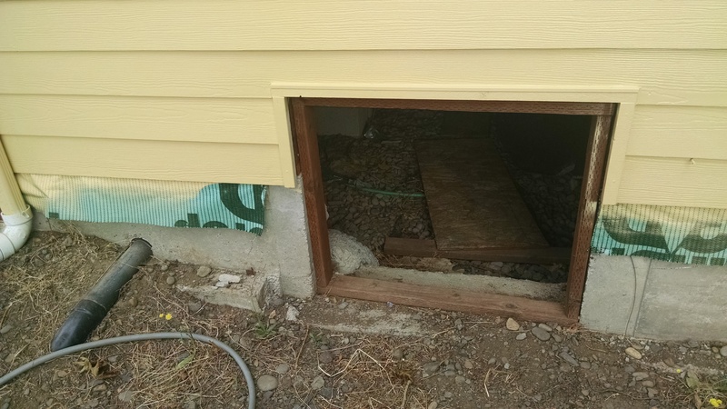 west face of the old house, entry to the crawl space.