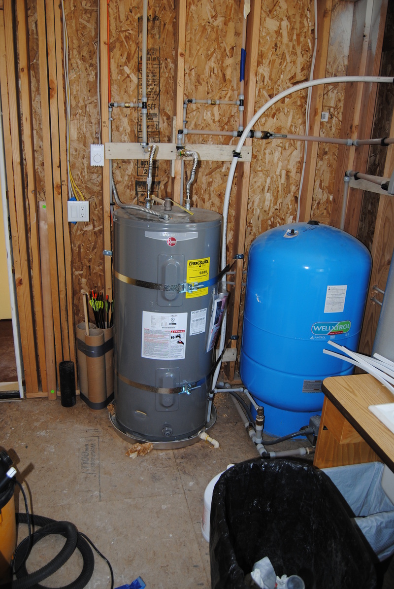 Hot water heater after both straps have been installed.