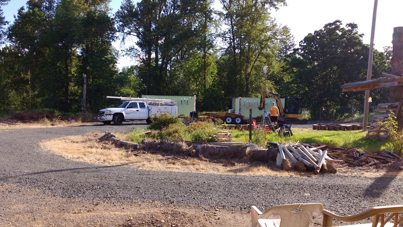 Royal Flush brought their excavator to dig some test holes where the new septic system is planned to go.