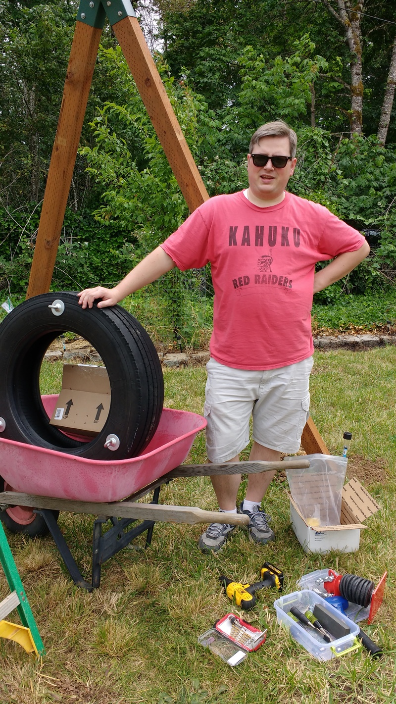 Daniel and the tire. Tools.