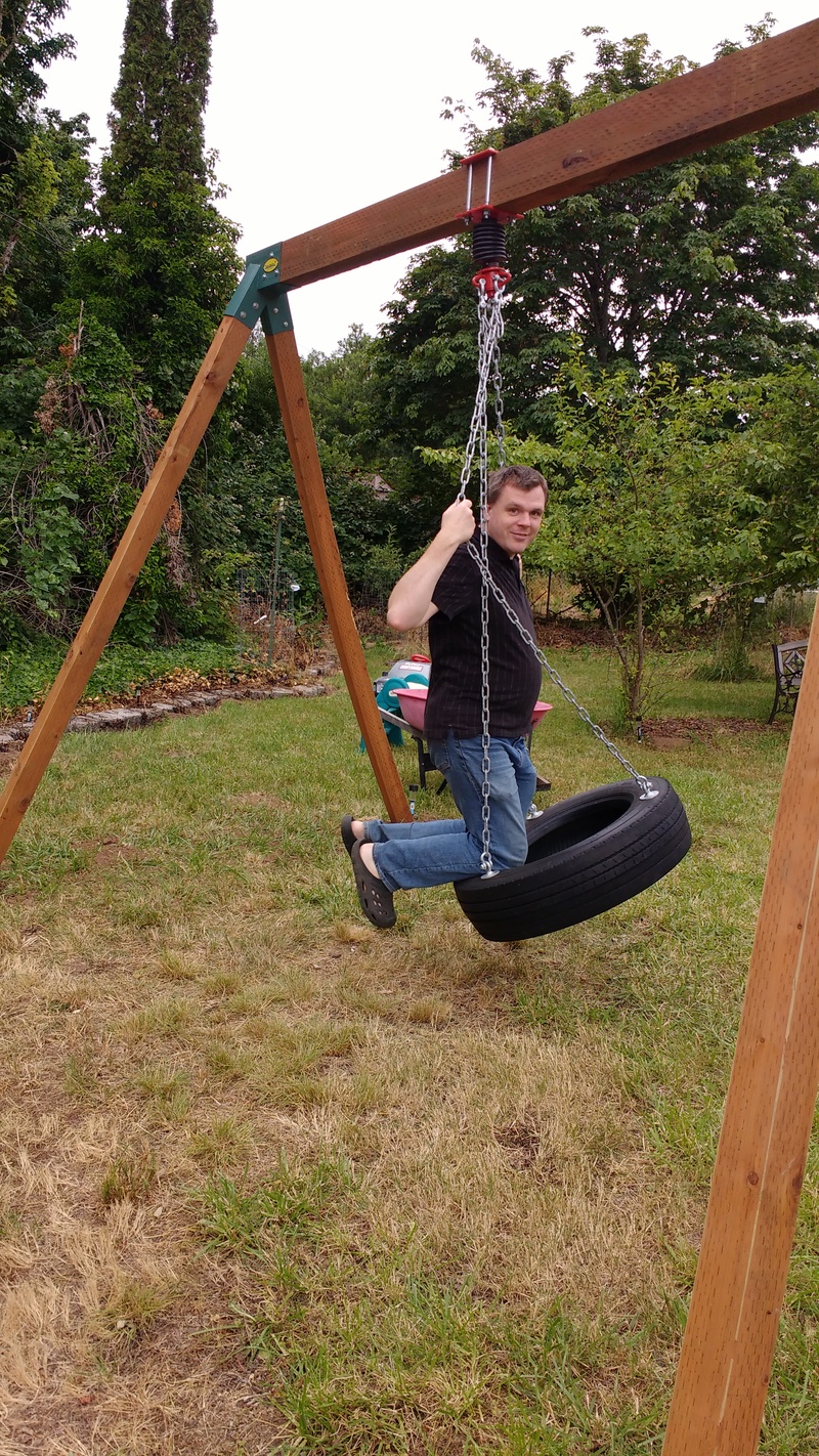 Joseph testing out the tire swing.