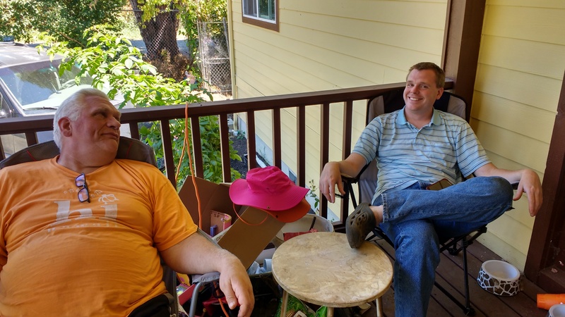 Don and Joseph relax on the front porch.