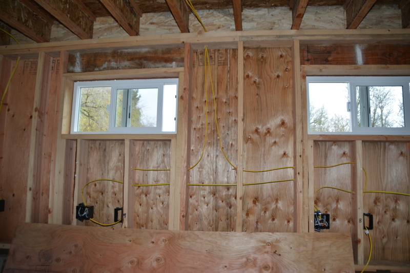 garage inside east wall; network jacks 9 (left) and 8 (right). Both windows.