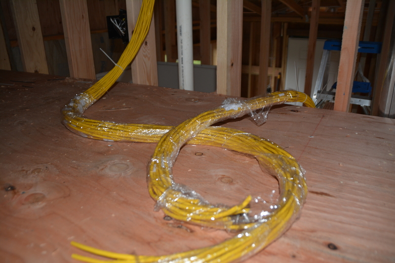 plastic wrap on cables to protect them against sheet rock mud and paint.