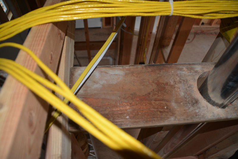 networking lines through the rafters; dryer vent duct.