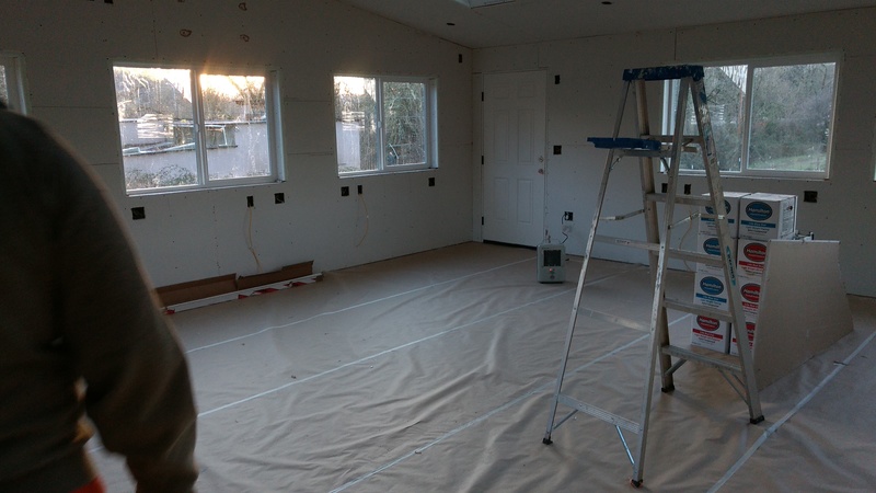 The guest room is rocked and edged and looks ready for the tapers to come, maybe tomorrow.