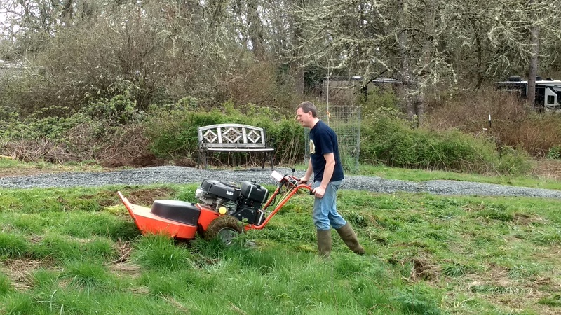 Joseph cuts down the weeds near Sunflower Hill with our trusty brush mower, Betsie.