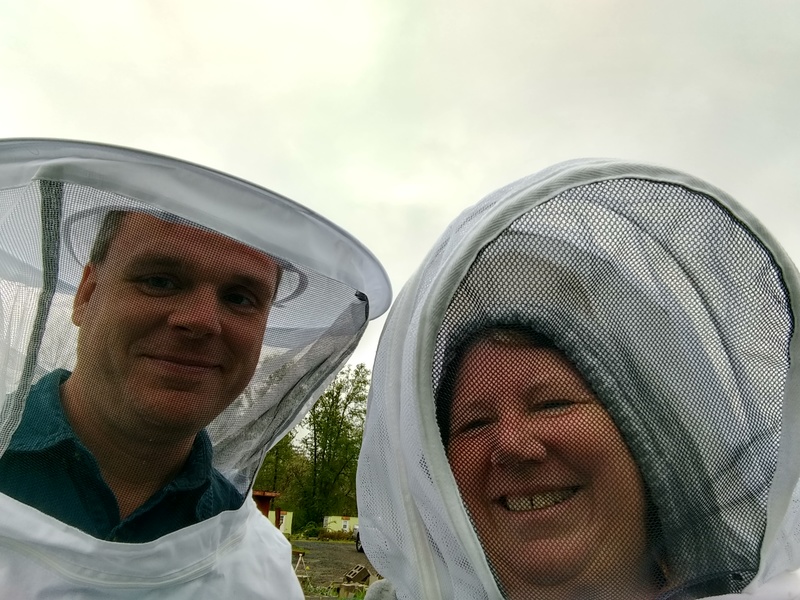 Joseph and Lois going out to check the health of the new bees.
