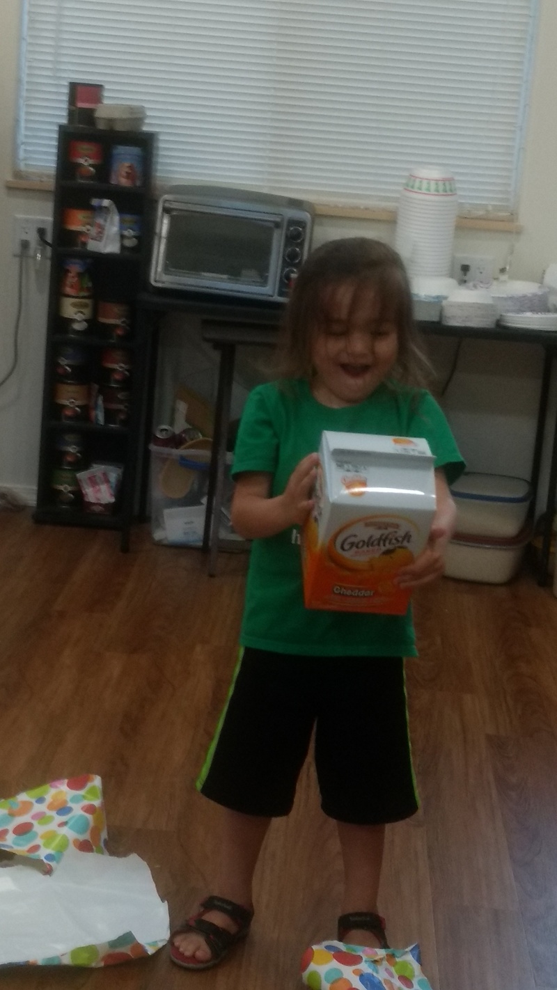 Kekoa receives a birthday present: Goldfish.