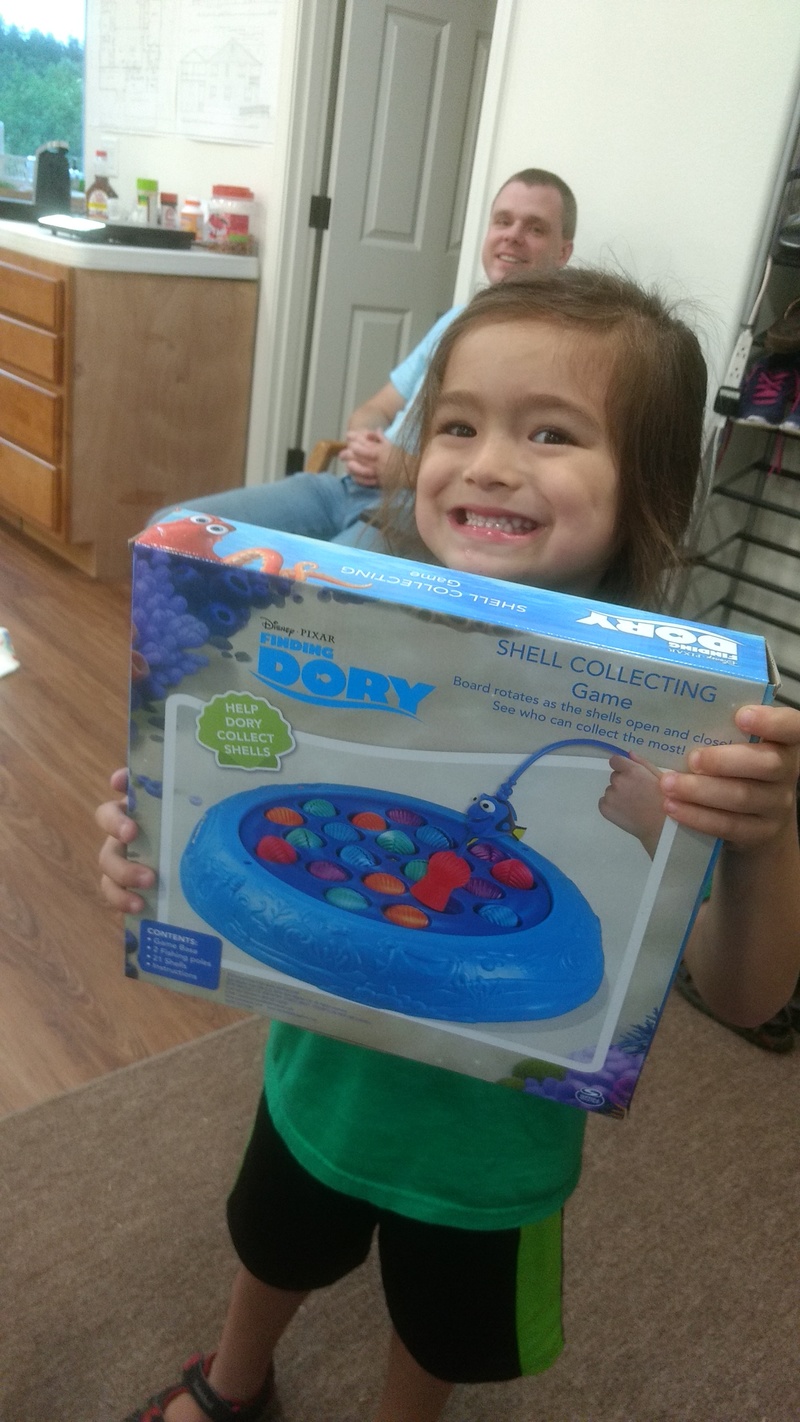 Kekoa receives a birthday present: Finding Dory Shell Collecting Game.