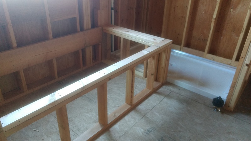 Frame for the soaking tub; pan for the shower. Room5 Master bathroom.