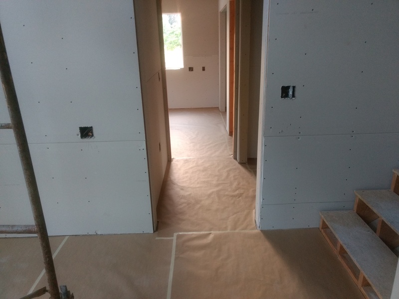 Hallway to Room4 west, paper on the floor.