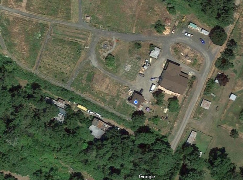 Recent Google satellite imagery of the house and parking areas.