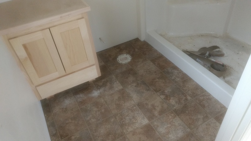 Bathroom Flooring and Cabinetry in rm3